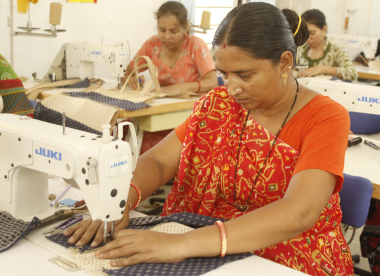 Three women leaders from a rural Self‑Help Group in Gujarat